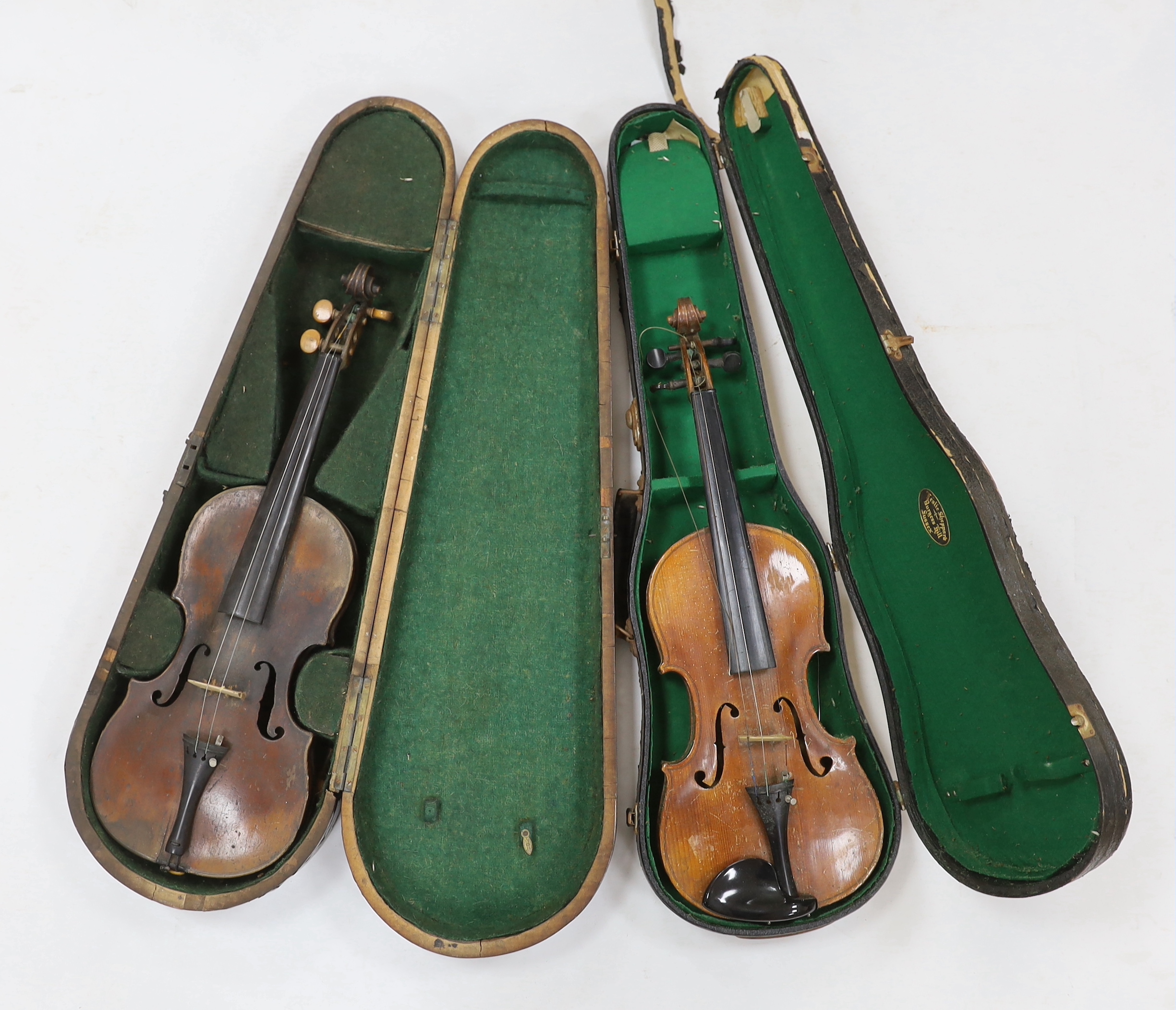 Two late 19th/early 20th cased century violins